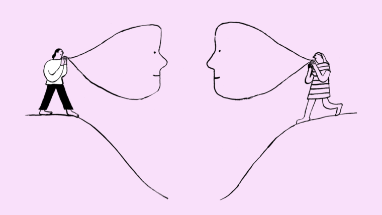 Two people talking to each other from separate, facing hills.