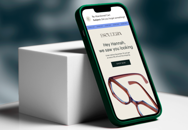 phone showing personalized email promoting eyeglasses